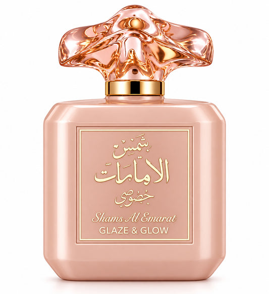 Noor Fragrances Shams Al Emarat Glaze & Glow perfume in a blush-toned bottle with an intricate sculptural cap.