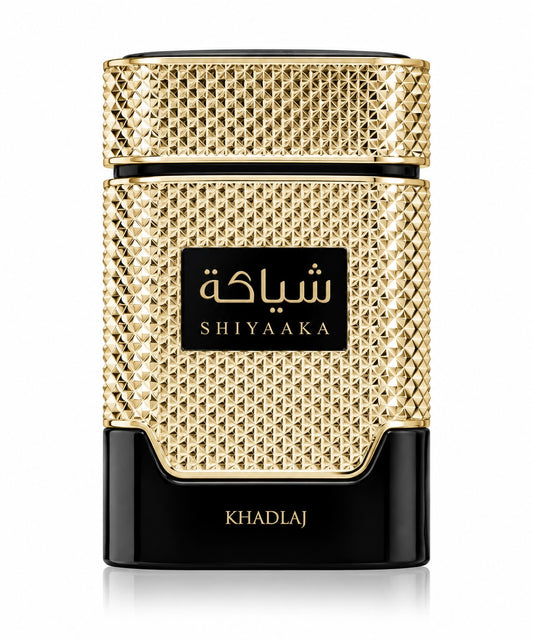 Noor Fragrances KHADLAJ Shiyaaka Gold perfume bottle with a textured gold metallic finish and black base.
