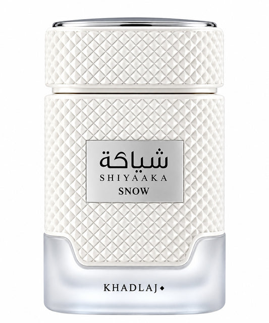Noor Fragrances KHADLAJ Shiyaaka Snow perfume bottle with a textured white finish and elegant silver accents.
