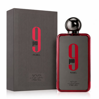 Noor Fragrances Afnan 9pm Rebel eau de parfum bottle and box in charcoal and red with bold typography