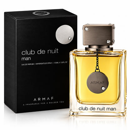 Noor Fragrances Armaf Club De Nuit Man Eau De Parfum bottle and black box featuring metallic accents and charm.
