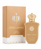 Noor Fragrances Crème Caramel Eau de Parfum in a beige bottle with a gold crown cap next to its matching gift box.