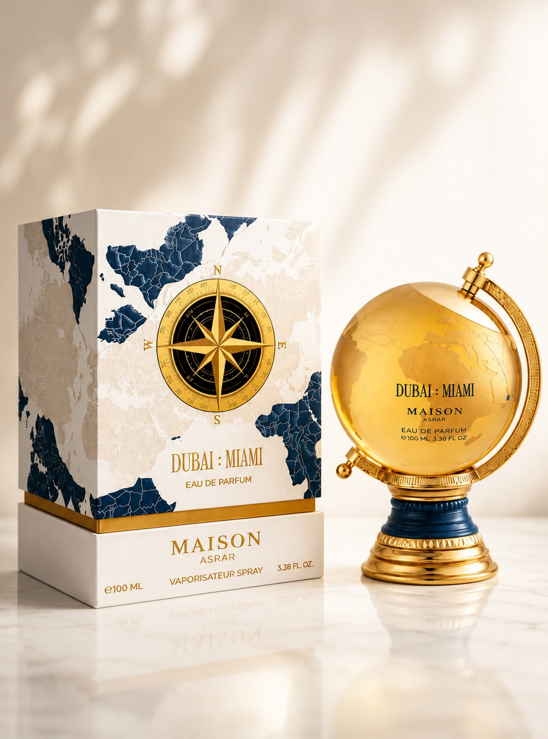 Noor Fragrances Maison Asrar Dubai: Miami perfume in a golden globe bottle next to a world map box on marble.