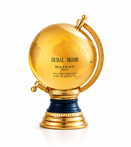 Noor Fragrances Maison Asrar Dubai: Miami Eau de Parfum in a decorative golden globe-shaped bottle on a white base.