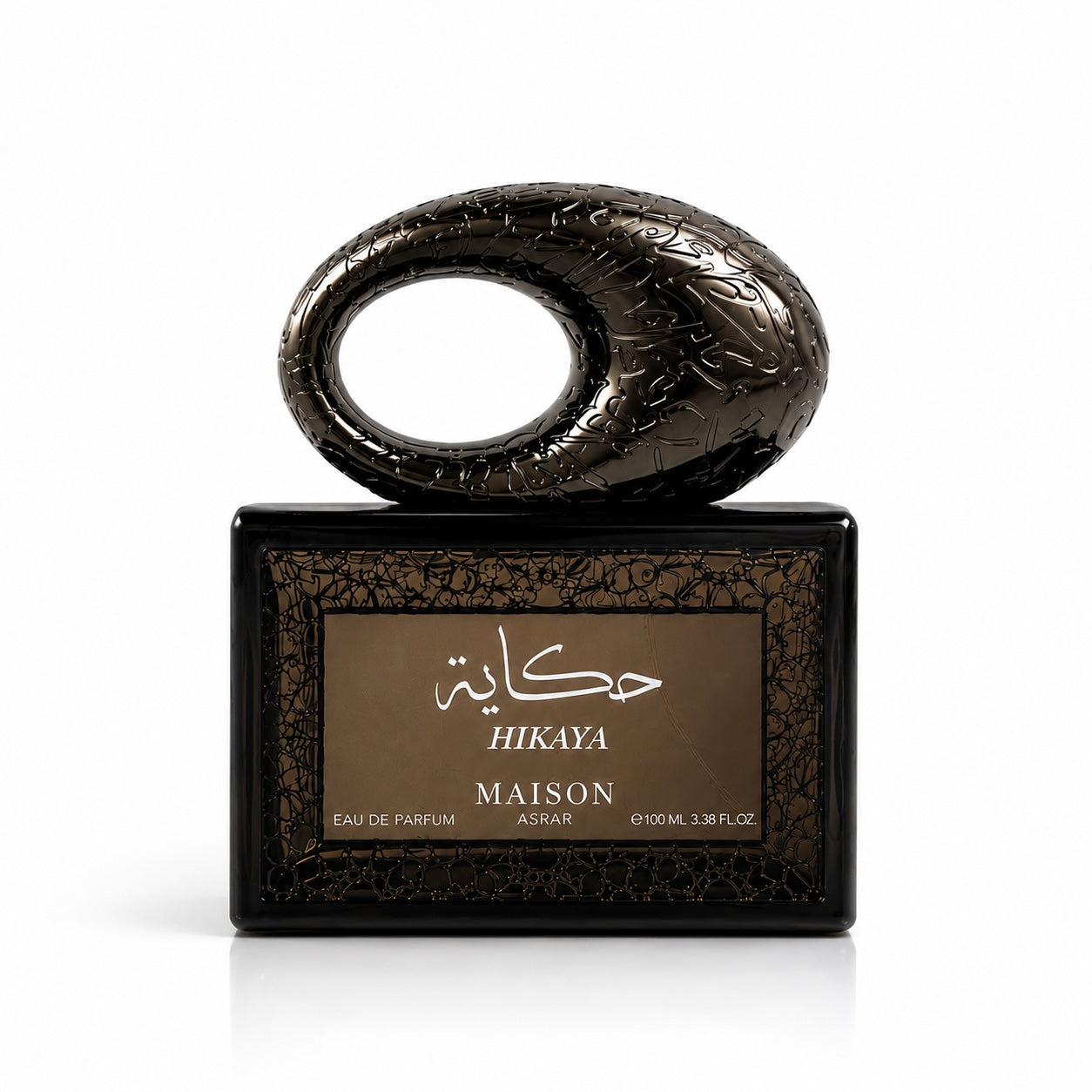 Noor Fragrances Maison Asrar Hikaya Eau de Parfum in a unique, dark metallic sculptural bottle with Arabic calligraphy.