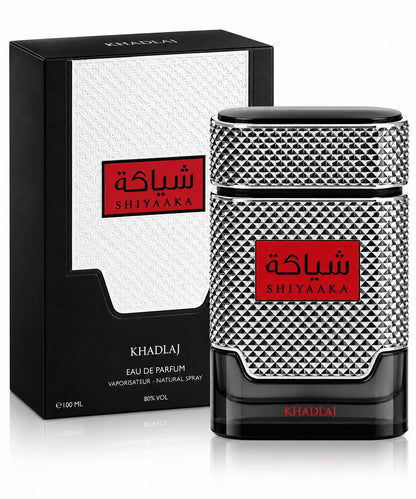 Noor Fragrances KHADLAJ Shiyaaka Eau De Parfum in a textured silver and black bottle with red accents and matching box