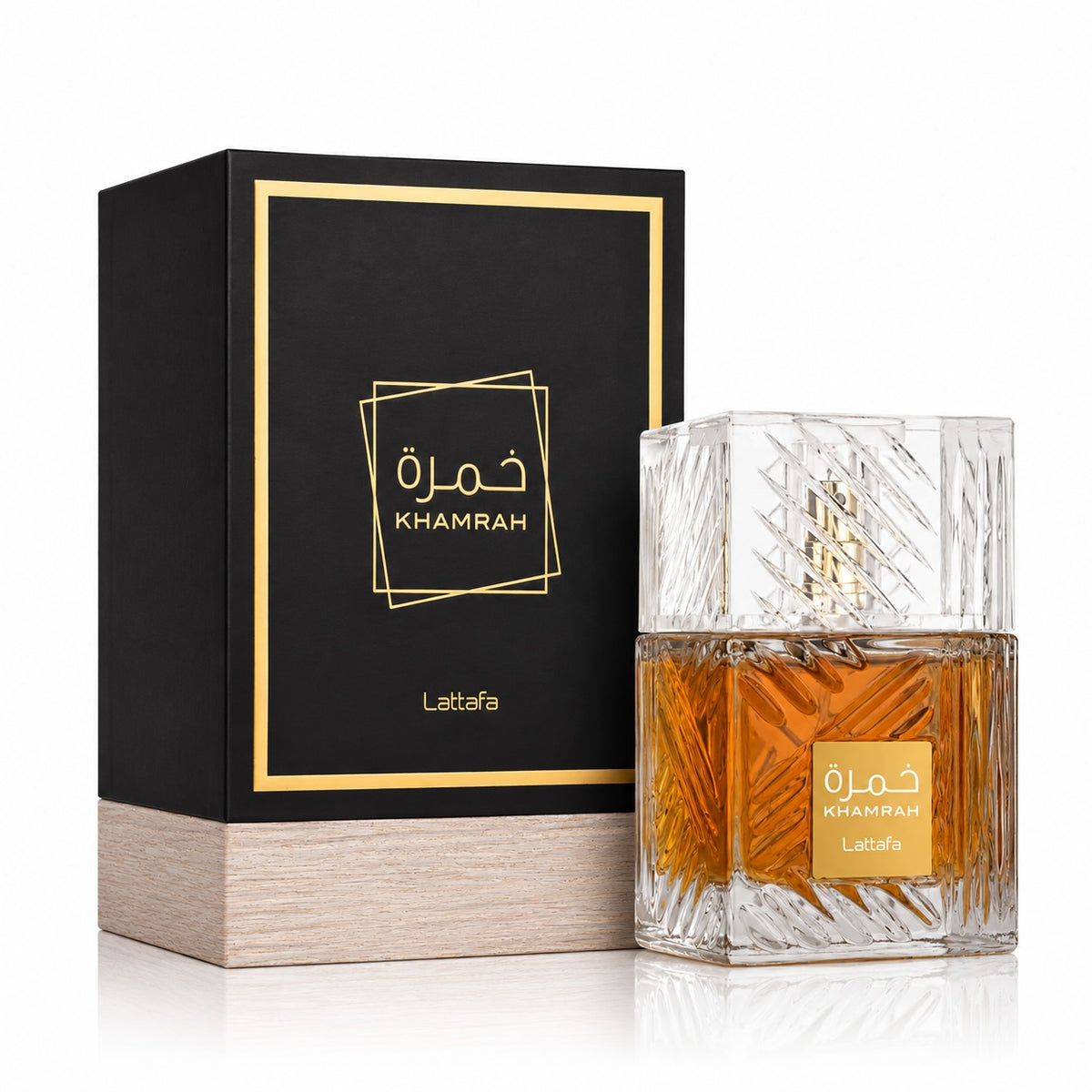 Noor Fragrances Lattafa Khamrah unisex Eau de Parfum in a heavy-cut crystal bottle with its elegant black gift box.