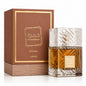 Noor Fragrances Lattafa Khamrah Qahwa eau de parfum in an intricately cut glass bottle next to its brown gift box.