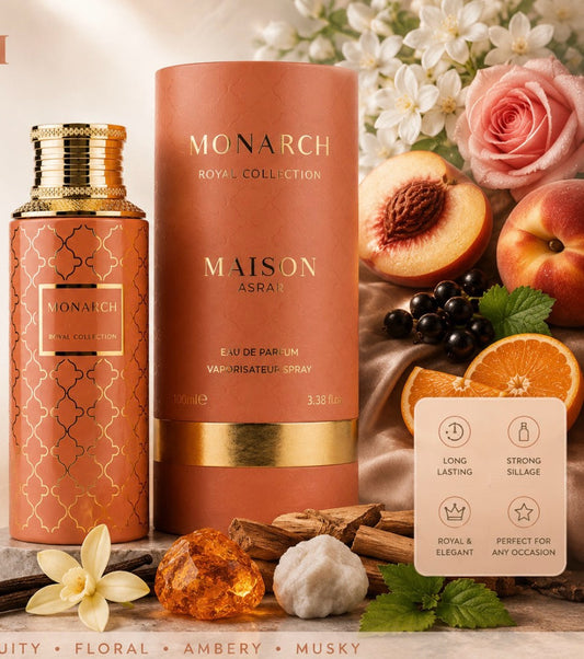 Noor Fragrances Maison Asrar Monarch perfume bottle and packaging in terracotta with gold accents and fruit motifs.