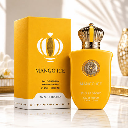 Noor Fragrances Mango Ice Eau De Parfum in a bright yellow bottle with a gold crown cap next to its matching box.