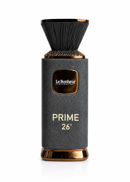 Noor Fragrances Le Bonheur Prime 26 Eau de Parfum in a textured charcoal-grey bottle with copper-toned accents.