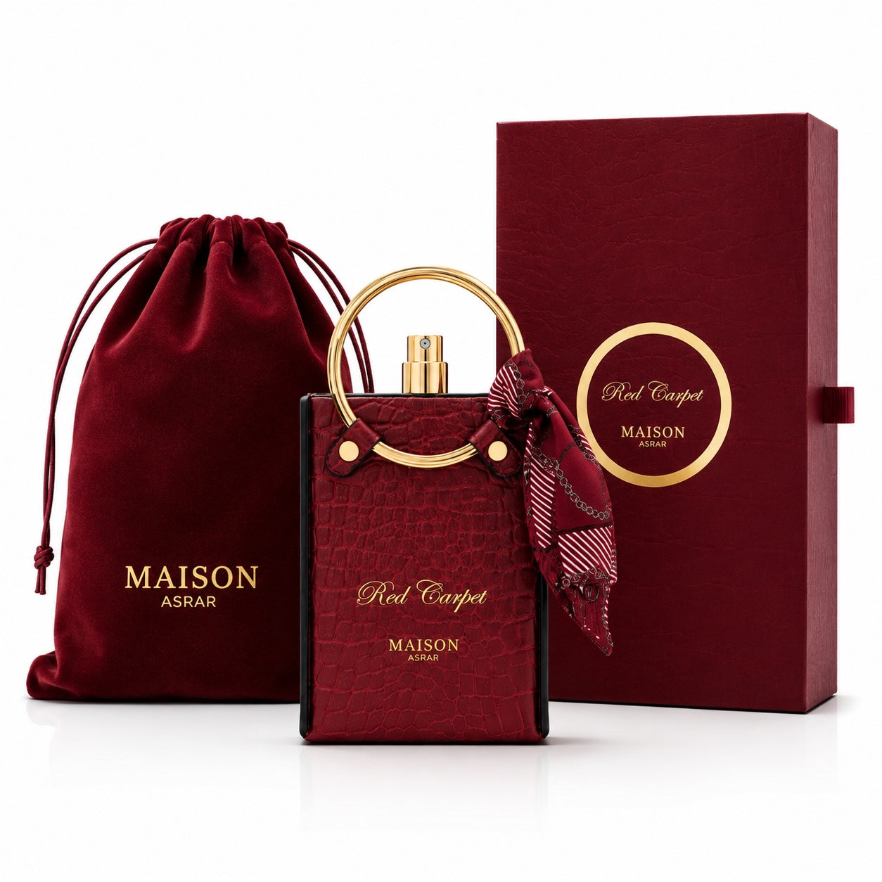 Noor Fragrances Maison Asrar Red Carpet perfume in a red crocodile-textured bottle with a gold handle and silk scarf.