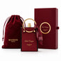Noor Fragrances Maison Asrar Red Carpet perfume in a red crocodile-textured bottle with a gold handle and silk scarf.