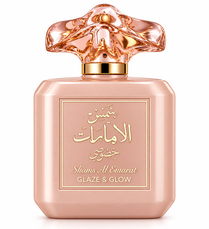 Noor Fragrances Shams Al Emarat Glaze & Glow perfume in a blush-toned bottle with an intricate sculptural cap.