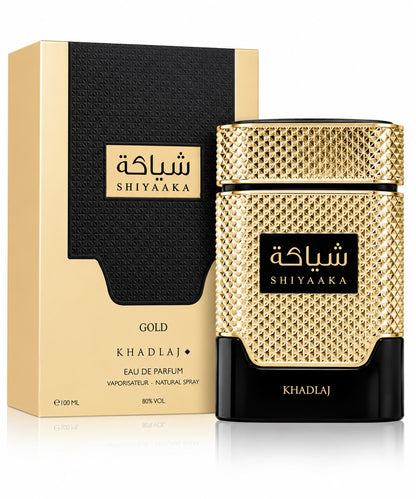 Noor Fragrances Shiyaaka Gold Eau de Parfum in a textured gold and black bottle with matching luxury gift box