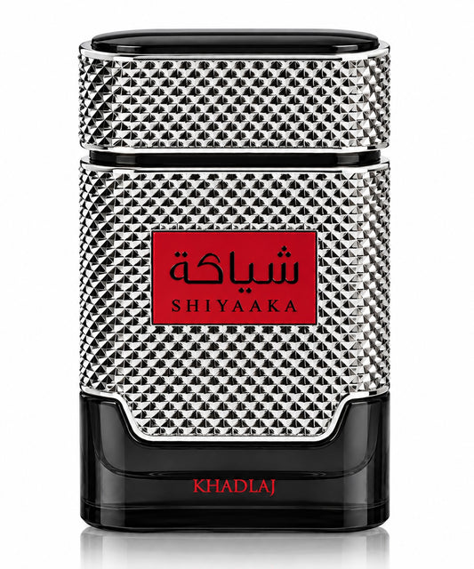 Noor Fragrances KHADLAJ Shiyaaka Eau de Parfum in a textured silver and black bottle with a bold red label