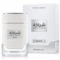 Noor Fragrances Khadlaj Shiyaaka Snow perfume bottle and box with textured white finish and silver accents.