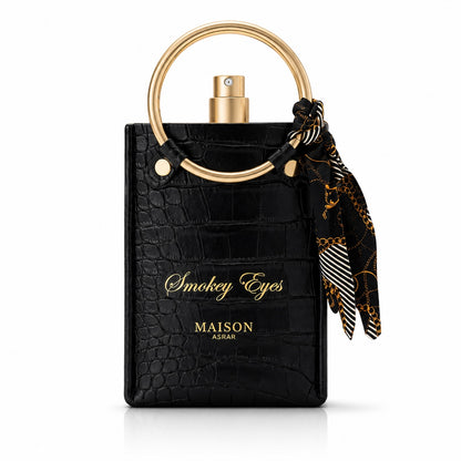 Noor Fragrances Smokey Eyes perfume in a black crocodile-embossed bottle with a gold circular handle and silk scarf.