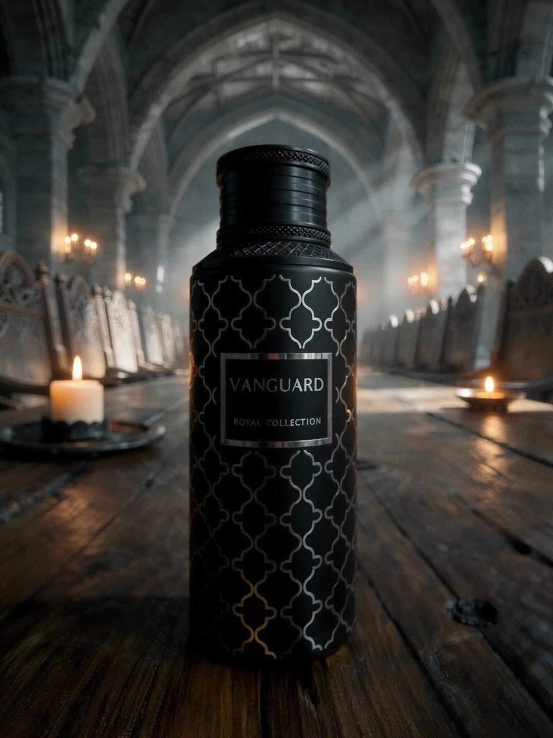 Noor Fragrances Vanguard Royal Collection perfume in a matte black bottle with silver geometric patterns on a table.